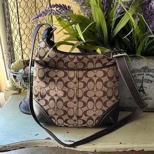 Authentic Coach crossbody bag with logo.